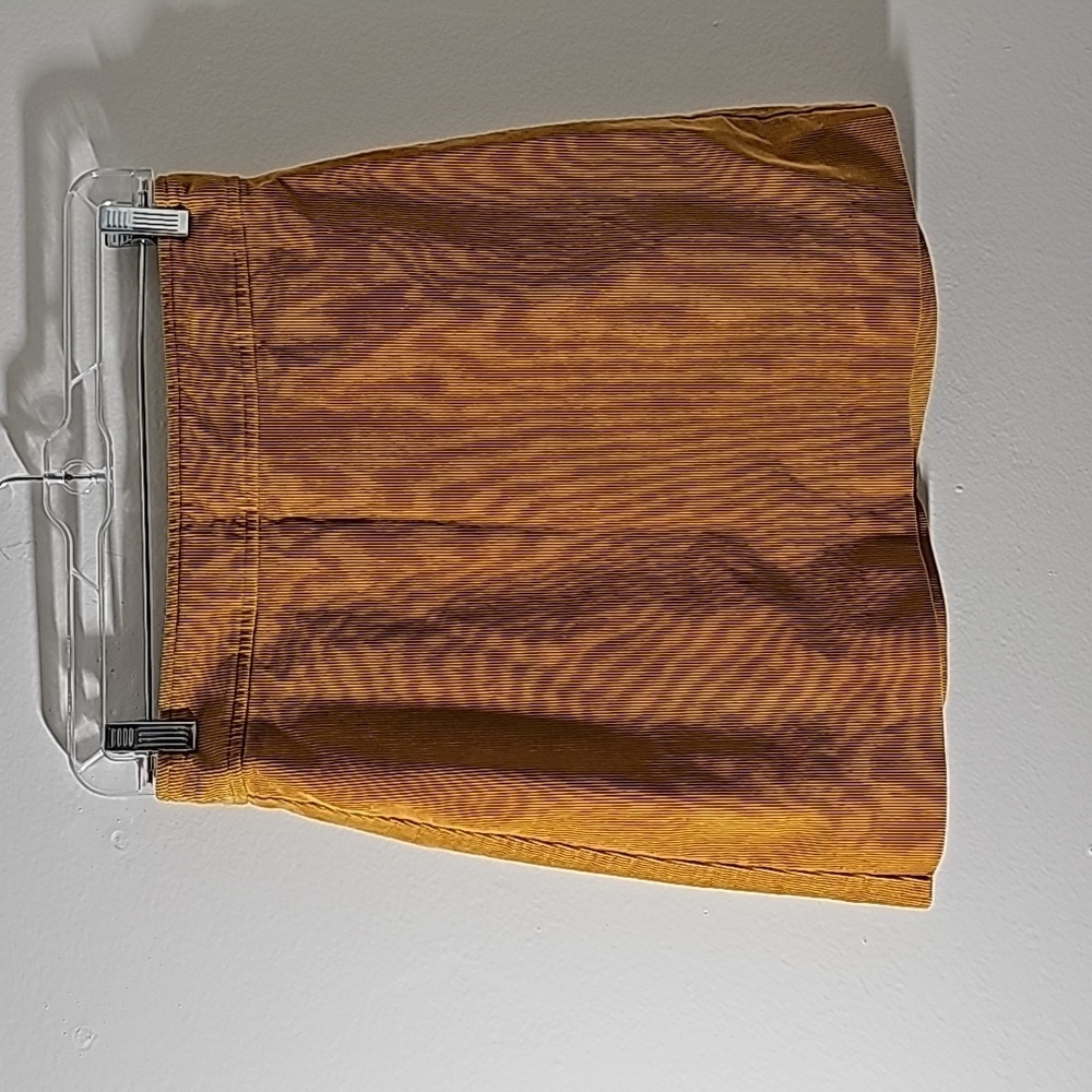 J.Crew mini Corderoy gold skirt. Rear zipper size 0.‎ Completely lined.